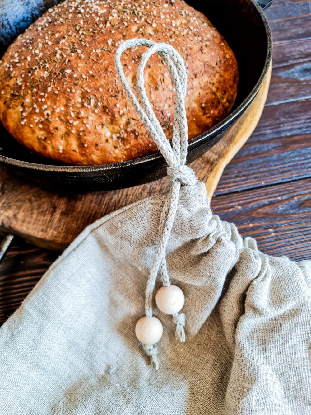 Rough linen bag with wooden beads