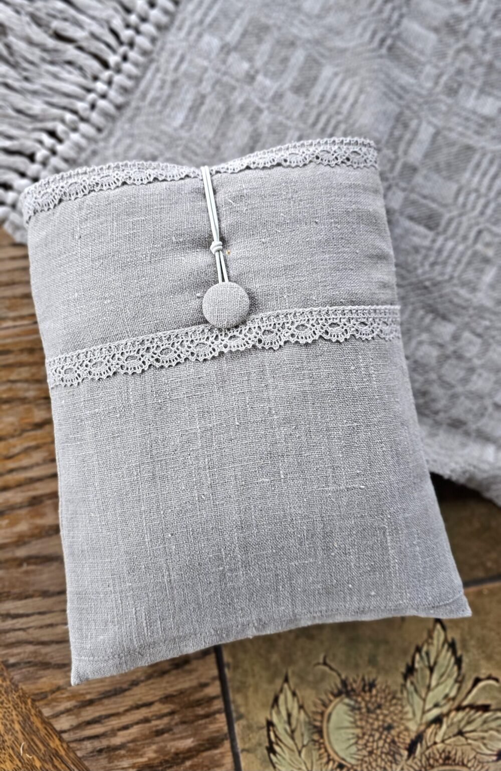 Raw linen book sleeve with lace
