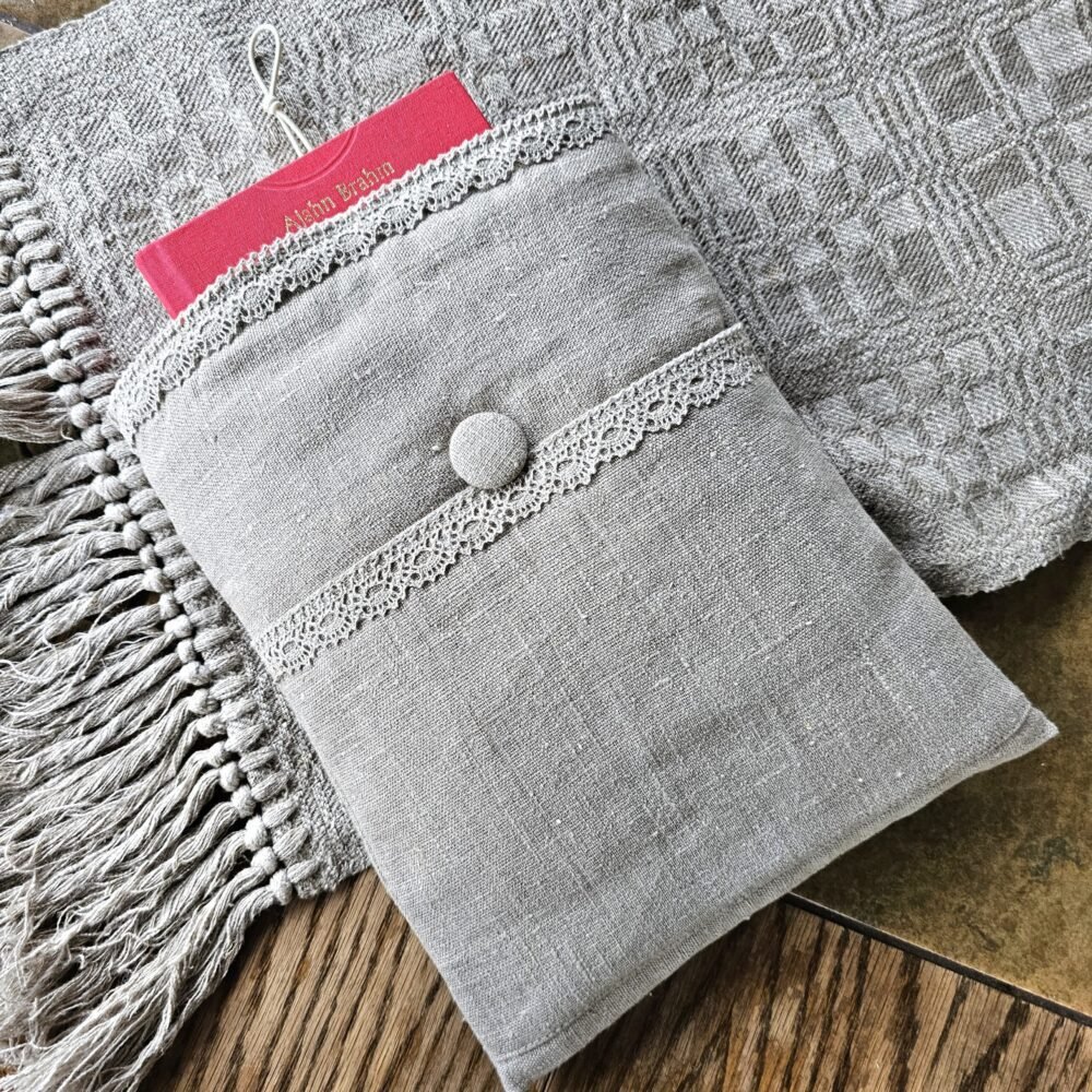 Raw linen book sleeve with lace